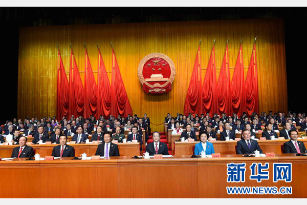 10月1日，慶祝中華人民共和國成立66周年暨新疆維吾爾自治區(qū)成立60周年大會在新疆人民會堂隆重舉行。 新華社記者 饒愛民 攝