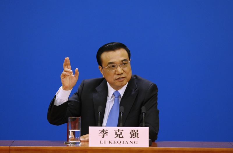 3月15日，國務(wù)院總理李克強(qiáng)在北京人民大會堂與中外記者見面，并回答記者提問。 新華社記者 沈伯韓 攝