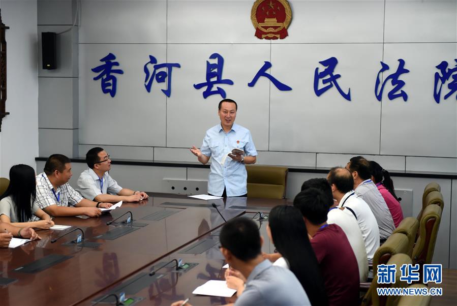 (新華全媒頭條·圖文互動(dòng))(5)開(kāi)啟全面依法治國(guó)新時(shí)代——黨的十八大以來(lái)全面依法治國(guó)新成就述評(píng)