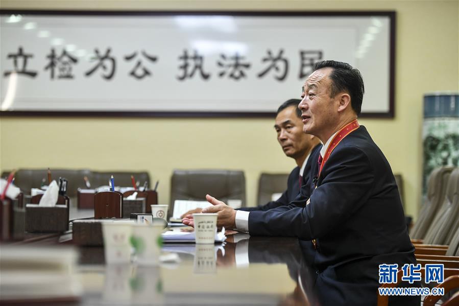 (改革先鋒風采·圖文互動)(3)張飚:維護社會公平正義的模范檢察官