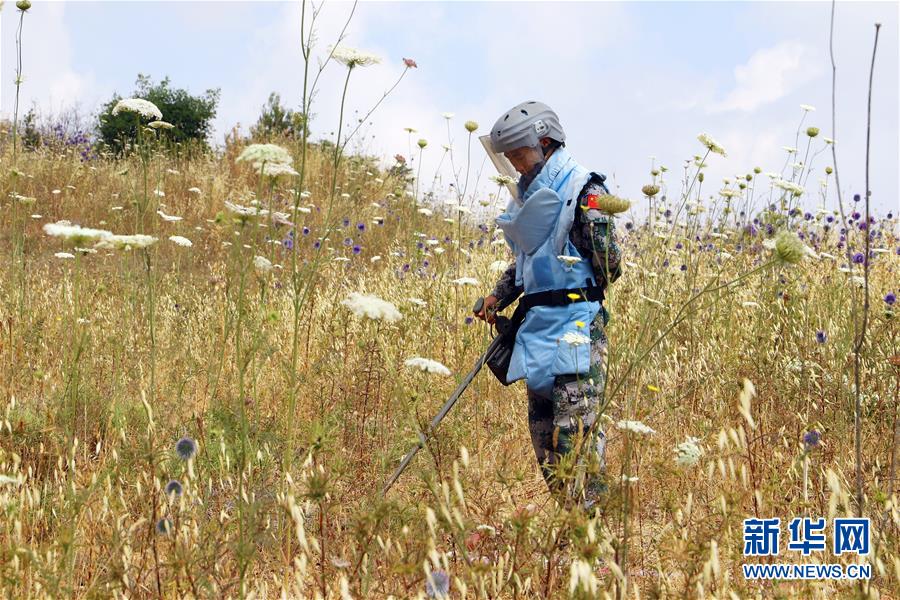 (國際·圖文互動)(2)通訊:向“時代楷模”看齊——記中國赴黎維和掃雷官兵對話杜富國