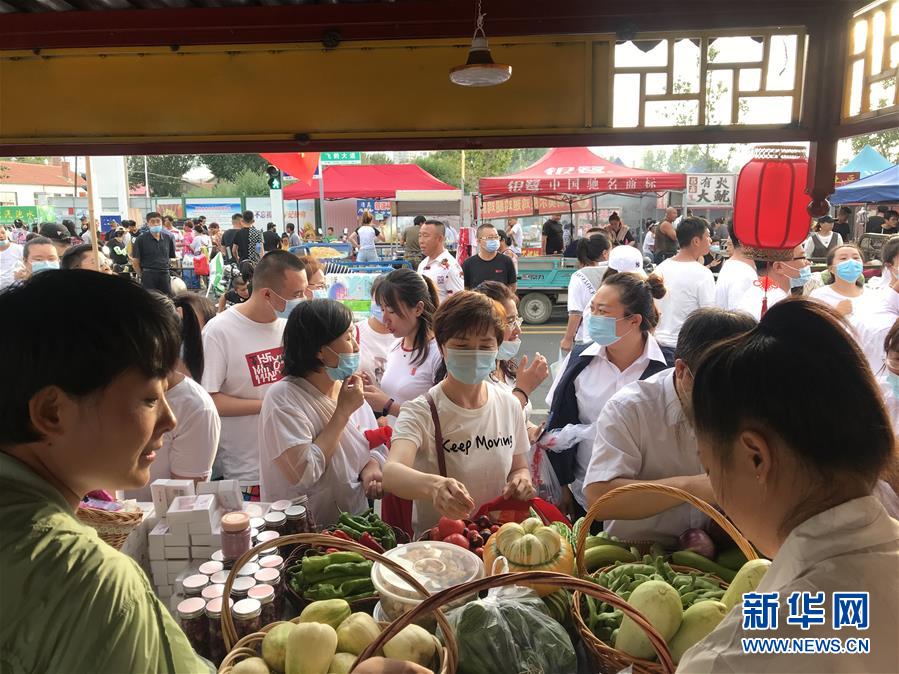 (決戰(zhàn)決勝脫貧攻堅·圖文互動)(1)扶貧夜市讓小城“煙火氣”升騰“致富味”