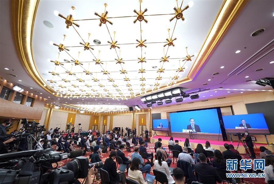 (兩會(huì)·XHDW)(16)國(guó)務(wù)委員兼外交部長(zhǎng)王毅回答中外記者提問