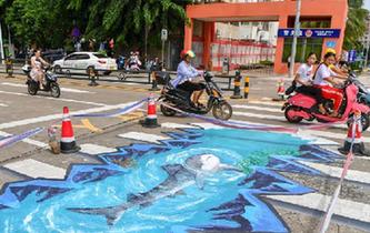 &ldquo;海洋世界&rdquo;3D立體斑馬線亮相?？? />  
<div>“海洋世界”3D立體斑馬線亮相海口</div>
</a> 
</div>
<div   id=