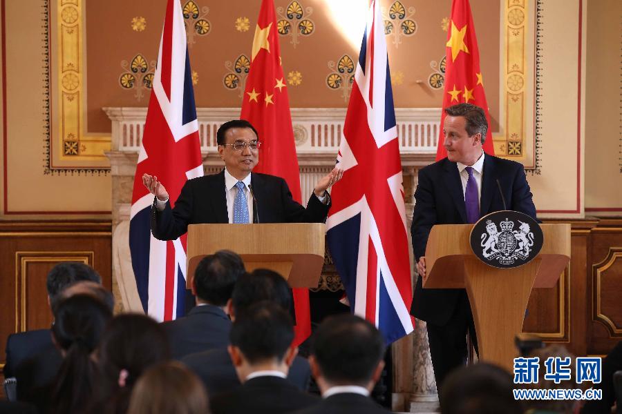 6月17日，國務院總理李克強同英國首相卡梅倫在倫敦舉行中英總理年度會晤后共同會見記者。新華社記者 龐興雷 攝