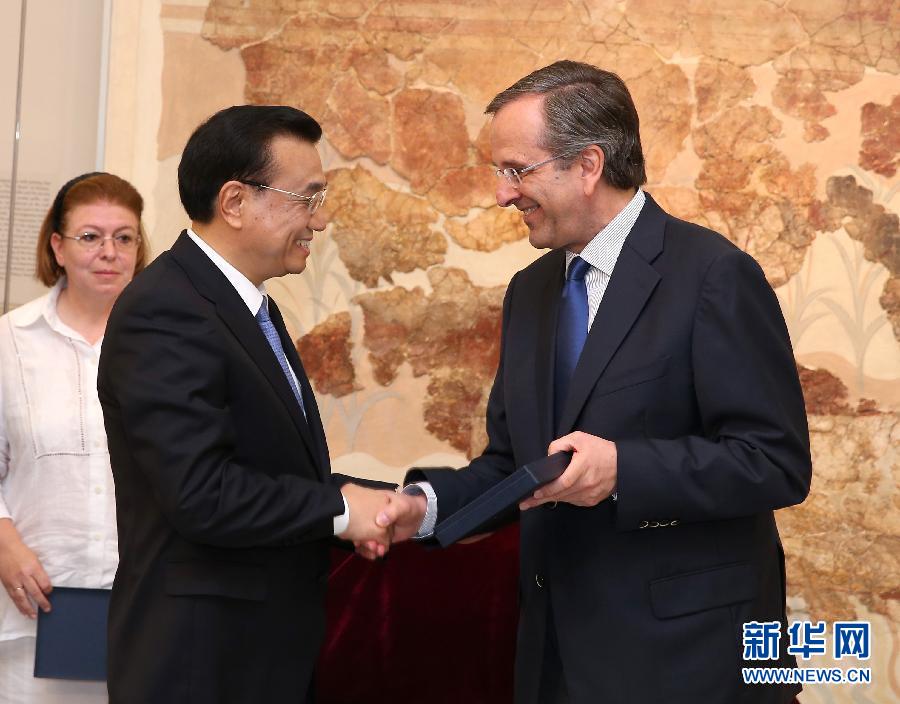 6月21日，國(guó)務(wù)院總理李克強(qiáng)與希臘總理薩馬拉斯共同出席希臘伊拉克利翁博物館新館開館儀式并發(fā)表講話。 新華社記者 龐興雷 攝