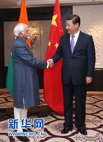 9月18日，國家主席習近平在新德里會見印度副總統(tǒng)兼聯(lián)邦院議長安薩里。 新華社記者 龐興雷 攝