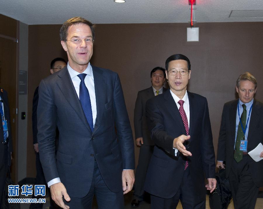 9月23日，出席聯(lián)合國氣候峰會的國家主席習(xí)近平特使、國務(wù)院副總理張高麗在紐約聯(lián)合國總部會見荷蘭首相呂特。 新華社記者 王曄 攝 