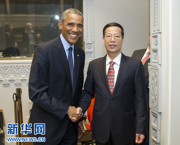 9月23日，國(guó)家主席習(xí)近平特使、國(guó)務(wù)院副總理張高麗在紐約會(huì)見出席聯(lián)合國(guó)氣候峰會(huì)的美國(guó)總統(tǒng)奧巴馬。 新華社記者王曄攝