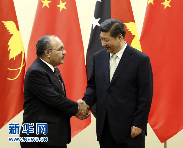 11月22日，國家主席習近平在斐濟楠迪會見巴布亞新幾內(nèi)亞總理奧尼爾。 新華社記者姚大偉攝 