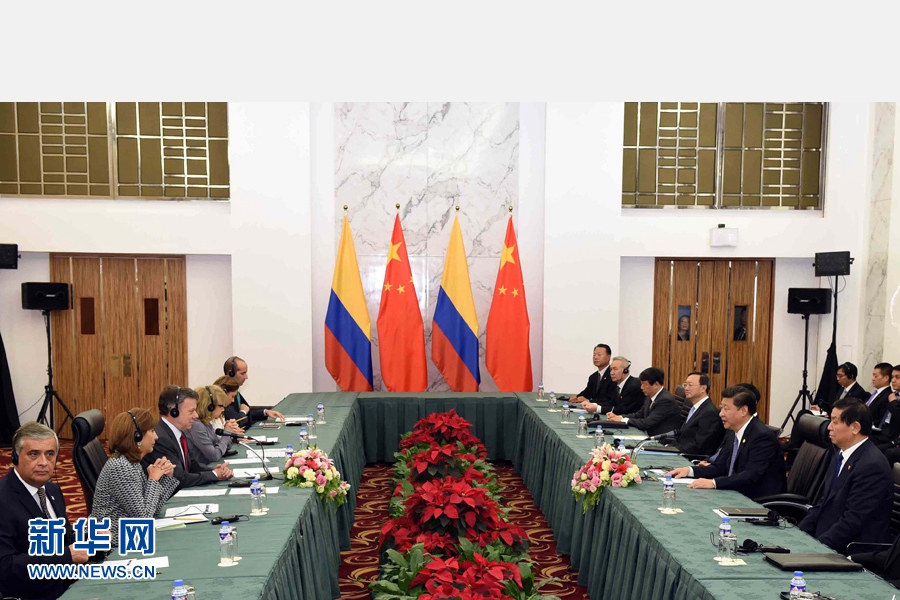 11月18日，國(guó)家主席習(xí)近平在菲律賓馬尼拉會(huì)見哥倫比亞總統(tǒng)桑托斯。 新華社記者 饒愛民 攝