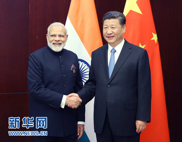 6月9日，國家主席習(xí)近平在阿斯塔納會見印度總理莫迪。 新華社記者姚大偉 攝