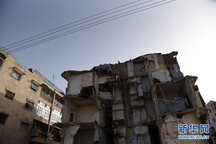 （國際&middot;圖文互動）（6）上學(xué)夢何處安放&mdash;&mdash;敘利亞女孩阿明娜的危樓生活