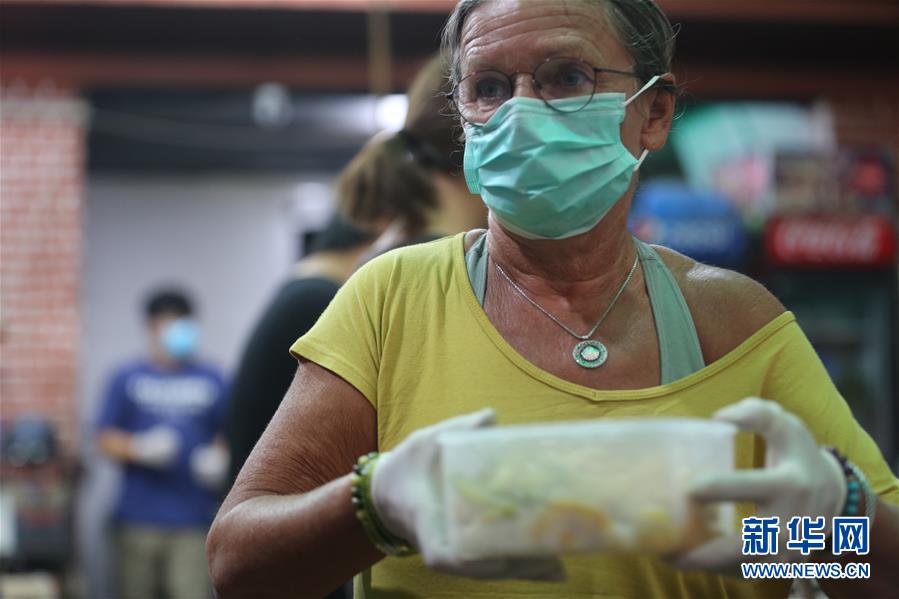 (國(guó)際疫情 ·圖文互動(dòng))(5)通訊:加德滿都中國(guó)人奉獻(xiàn)的“愛心便當(dāng)”