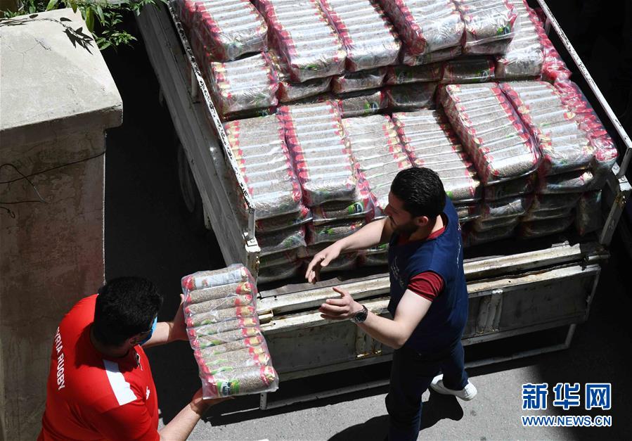 （國(guó)際疫情&middot;圖文互動(dòng)）（1）通訊：疫情中，那抹笑容最難忘&mdash;&mdash;記向困難家庭發(fā)放愛(ài)心包裹的敘利亞青年志愿者